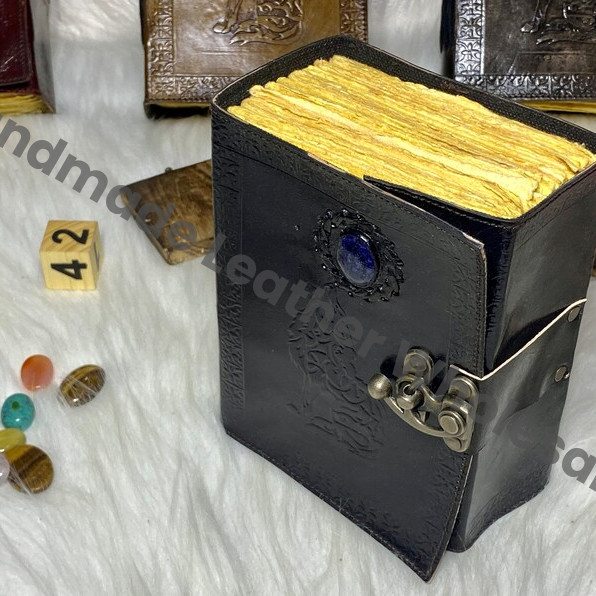 Embossed Wolf Leather Journal: Antique Stone Lock, Deckle Edge Paper